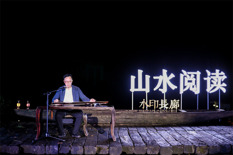 覃斌彈奏《陽關三疊》.jpg